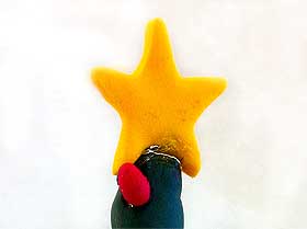 Close-up of a Fimo star created with cake decoration cutter 