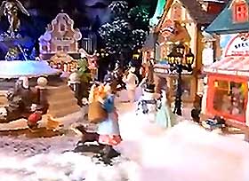 Further view of the Christmas village and its street lined with shops