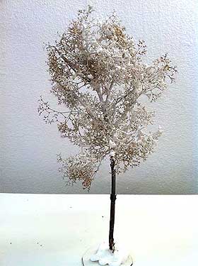 Photo of a model tree made for a winter village from seafoam