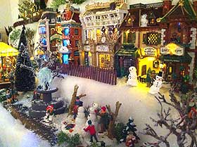 Picture of Christmas Village at night, showing Lemax fencing